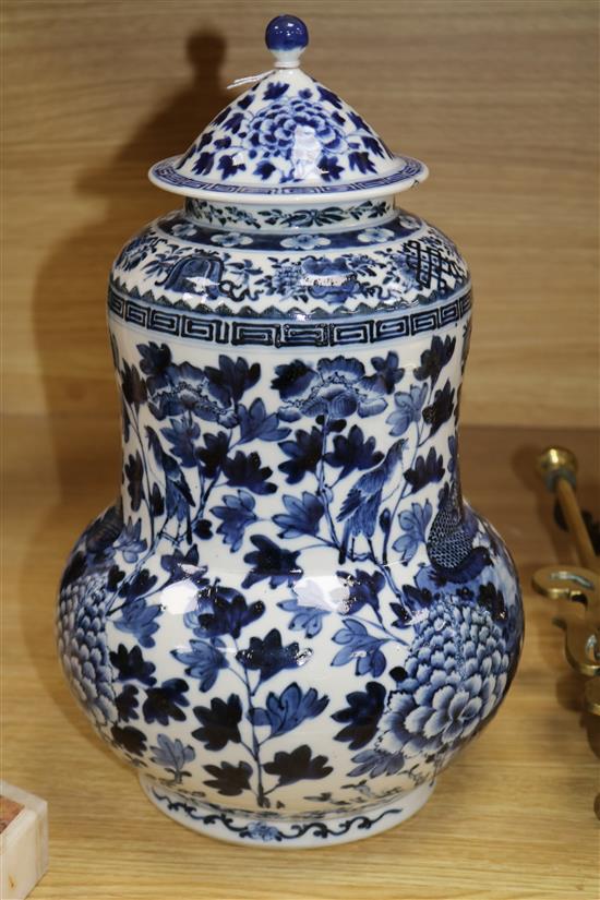 A Chinese blue and white jar and cover, Kangxi mark but late 19th century height 37cm